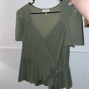 Green woman’s cross over top!